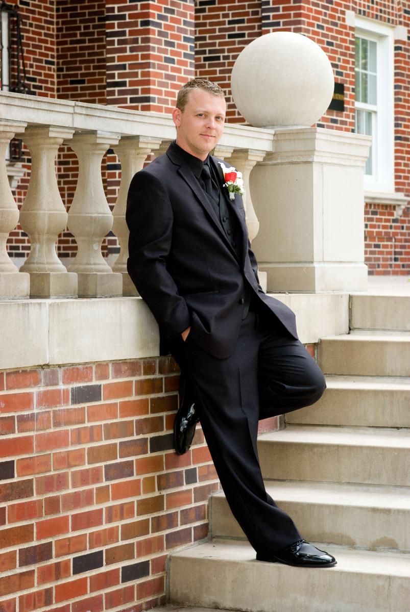 Charismatic portrait of a good-looking groom within a courtly set, by Robertsons' Warehouse Photography, Wichita, KS