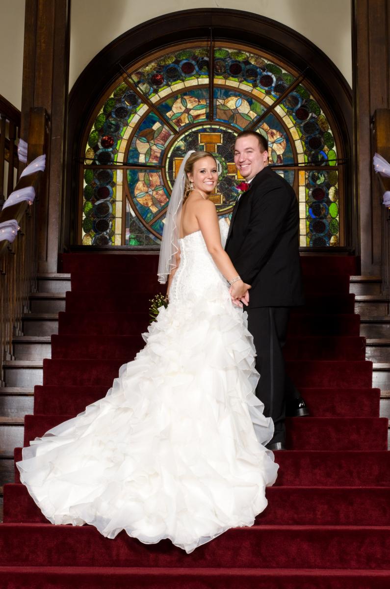 Formal altar wedding portrait with an alluring twist, by Robertsons' Warehouse Photography, Wichita, KS