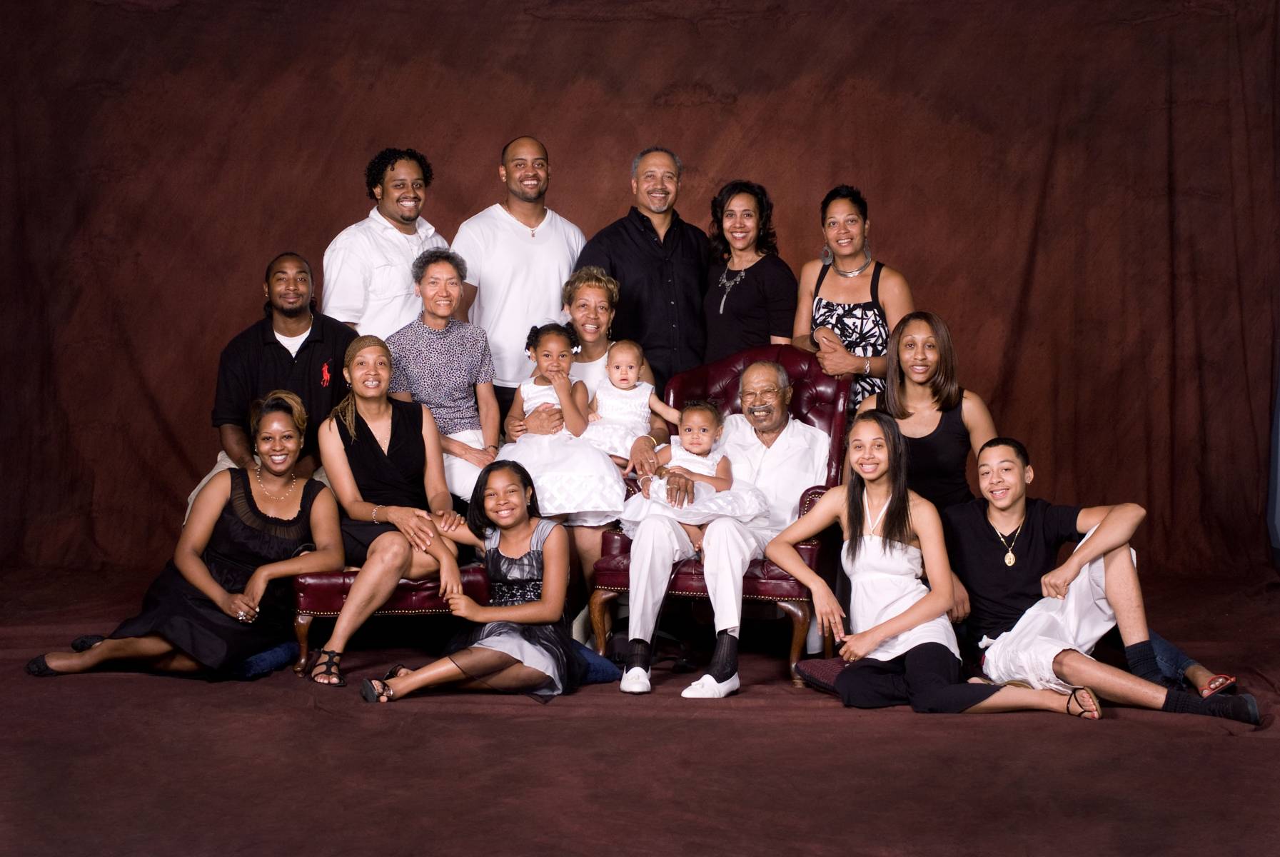4 generation portrait of the McIntosh family photographed inside Robertsons' Warehouse Photography Studio, Wichita, KS, celebrating their 50th Golden Wedding Anniversary