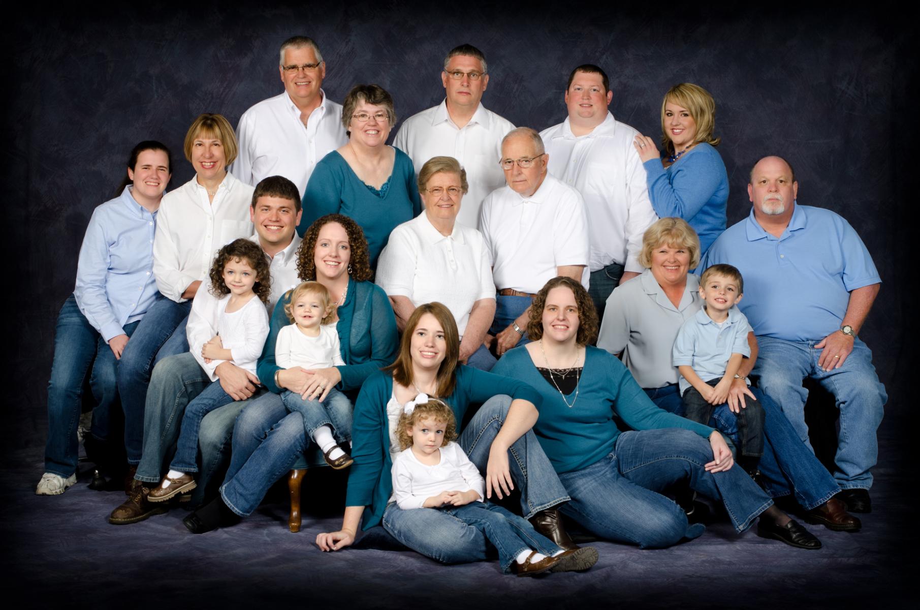 The Greenlee extended family photographed on a professional painted studio background, by Robertsons' Warehouse Photography, Wichita, KS