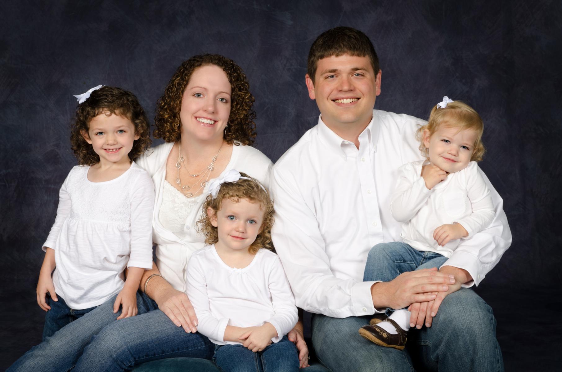 Classic close-up picture of a one unit family to visually preserve this memory, by Robertsons' Warehouse Photography, Wichita, KS
