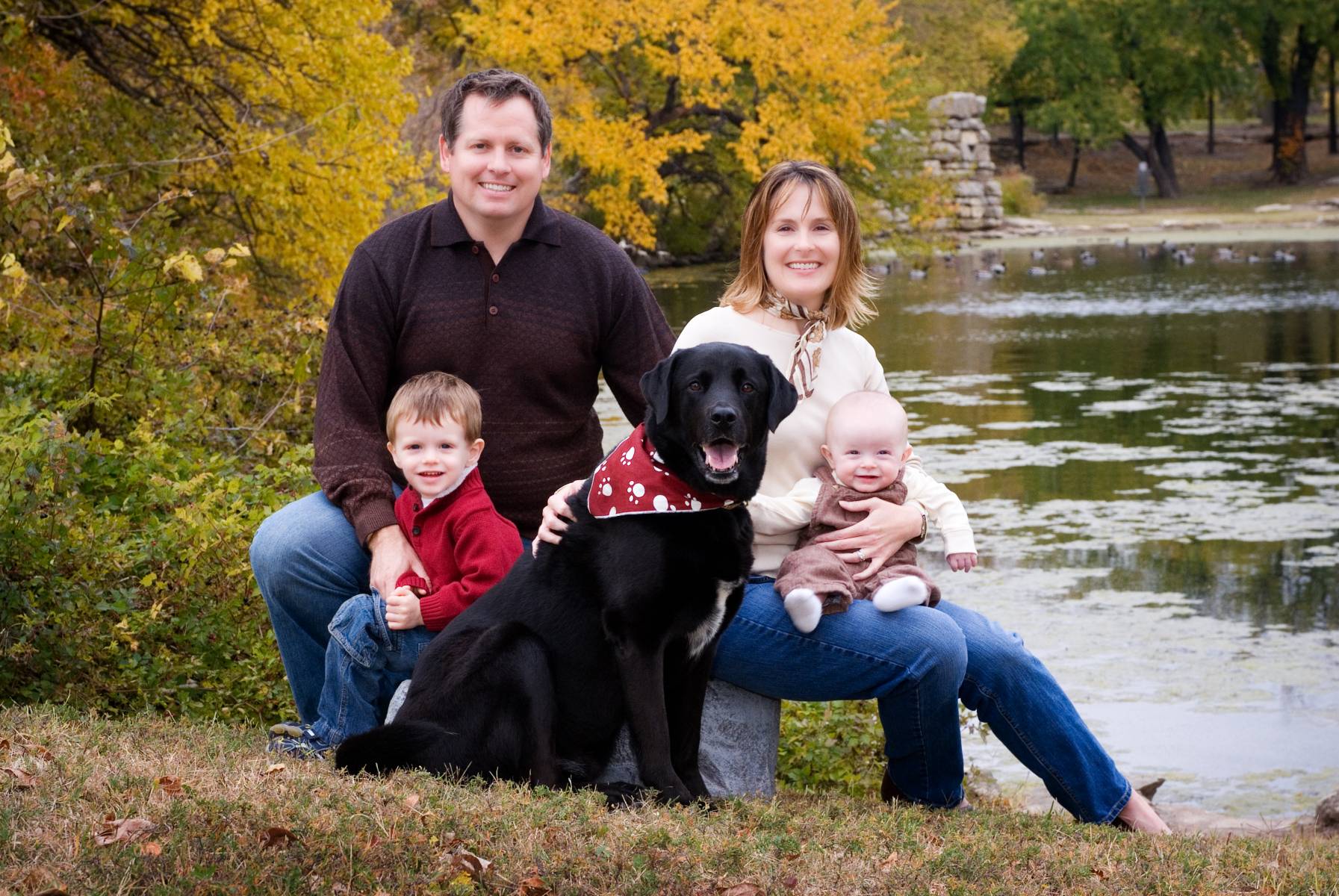 The Lee family were photographed in front of Wichita's Giant's Bathtub and brilliant golden fall colors, by Robertsons' Warehouse Photography, Wichita, KS
