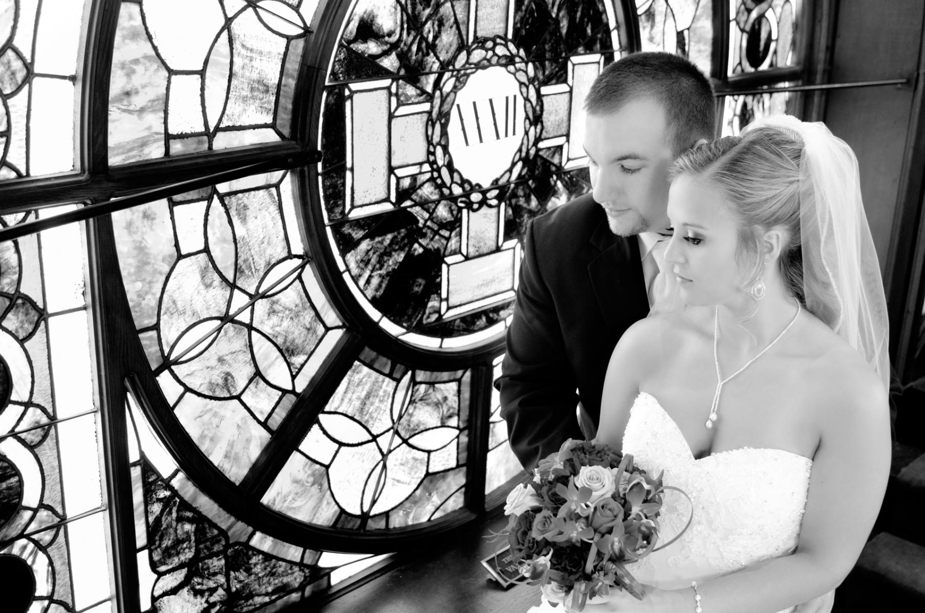 Black and white emphasizes the detail in the stainglass in this wedding photo, by Robertsons' Warehouse Photography, Wichita, KS