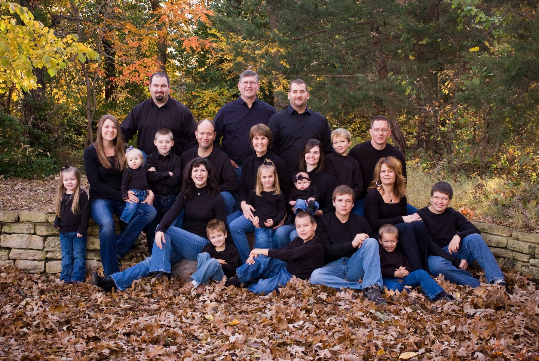 The Dalbom family took advantage of autumn's magnificent display of color for a spectacular extended family portrait, by Robertsons' Warehouse Photography, Wichita, KS