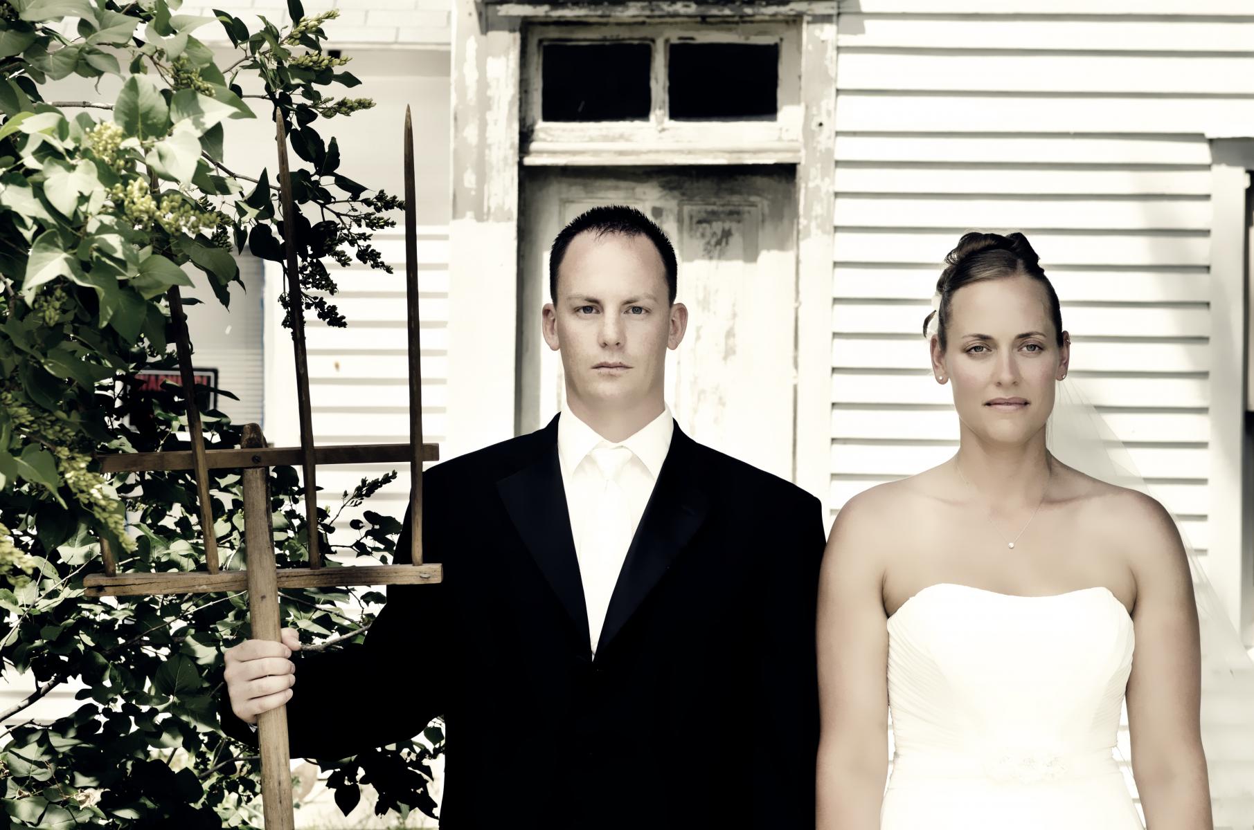 Replicated the American Gothic image to add flavor to this  small town Kansas wedding, by Robertsons' Warehouse Photography, Wichita, KS